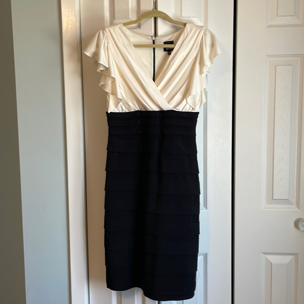 Women’s dress. Size 8, black and off-white. Has some stretch to it, very comfy!